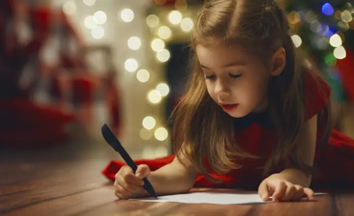 Niños escribir carta Reyes Magos