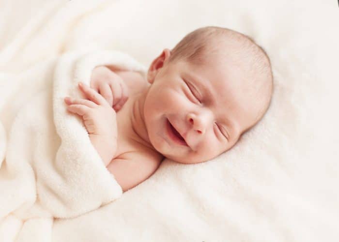 Sonrisa angelical bebé