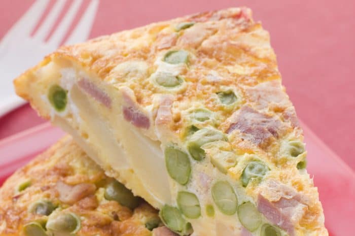 Receta Tortilla de patatas con guisantes y jamón
