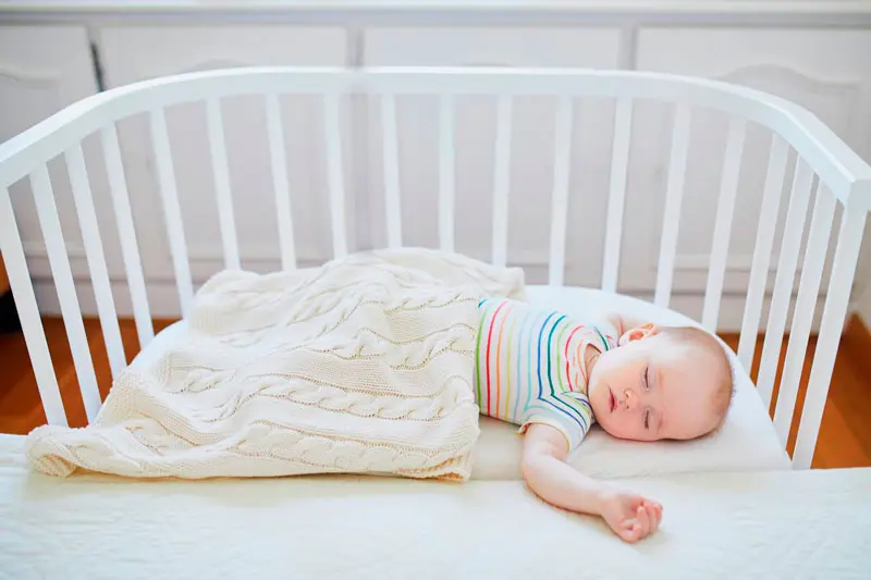 enseñar hijo bebé dormir