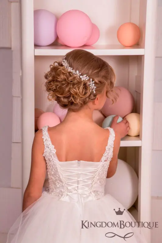 Peinado comunión niña Moño al descuido